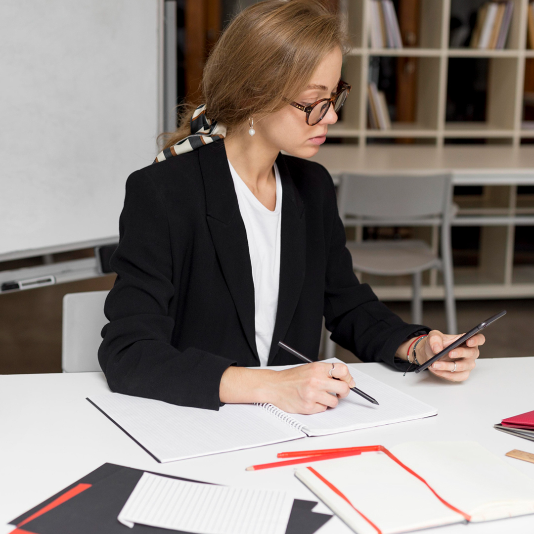 Lady Checking Mobile - Travel Insurance in Dubai UAE