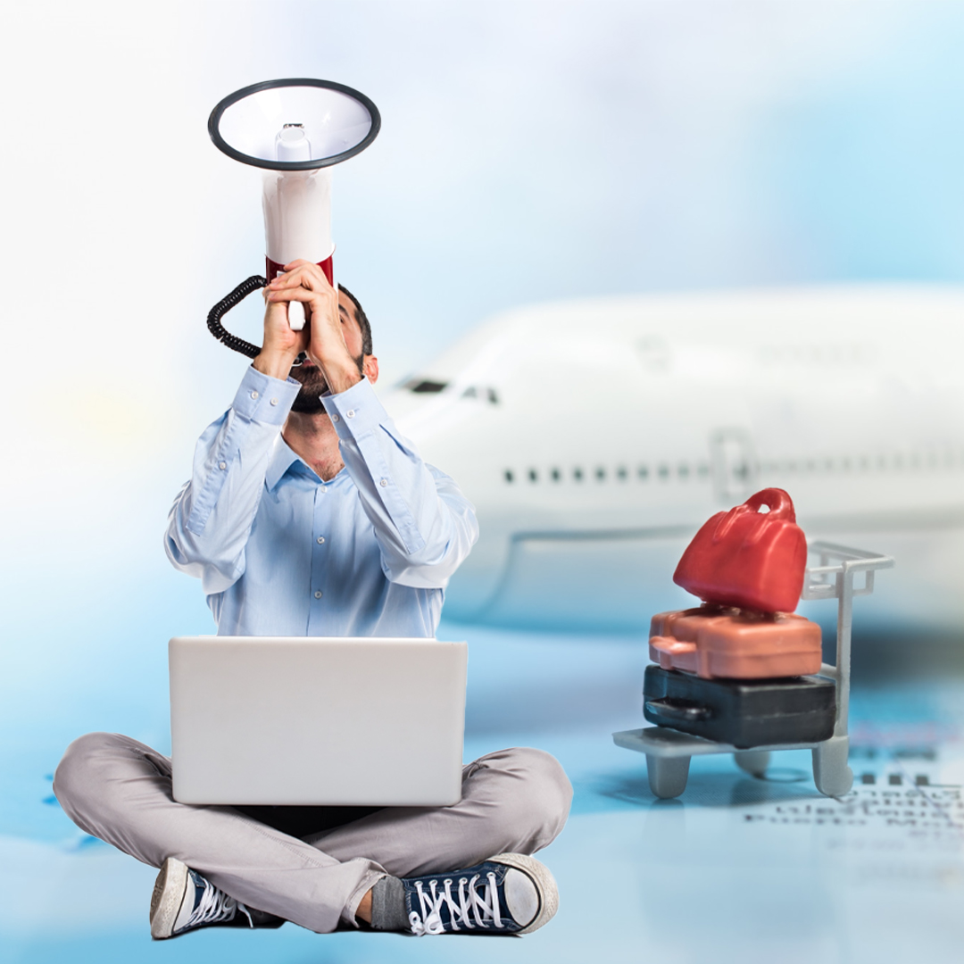 Man sitting with Laptop & Speaker Airplane & Travel Bag at Background - Travel Insurance in Dubai UAE