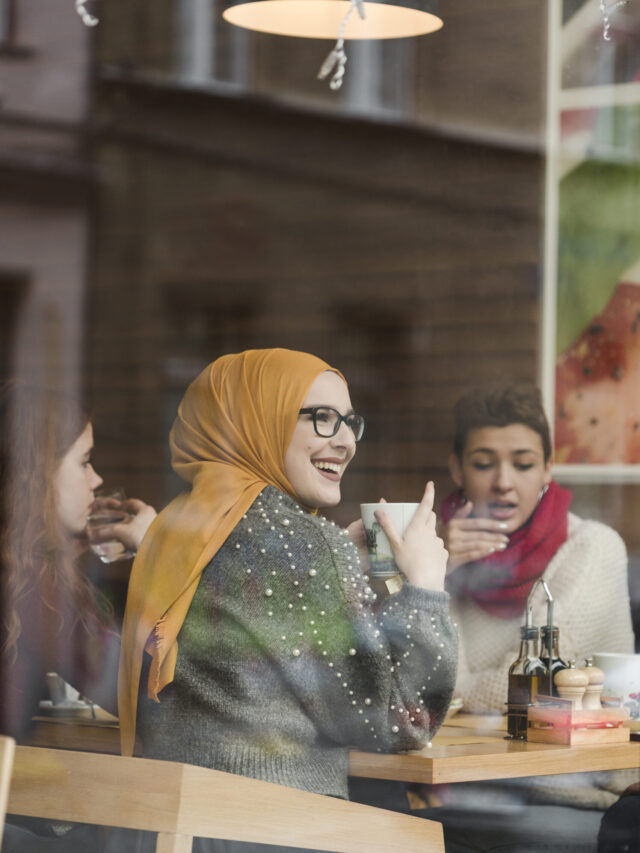 young-women-enjoying-coffee-together